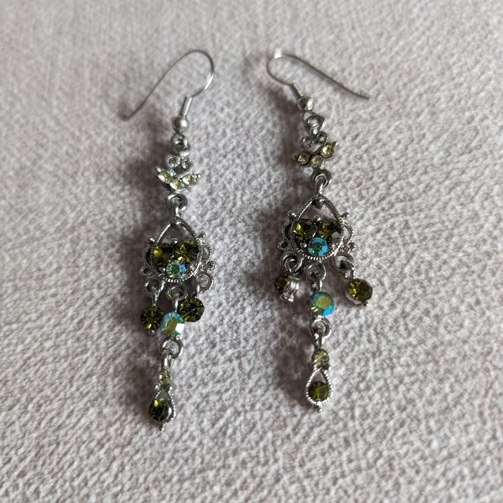 Silver-colored Dangly Earrings with Embellishments and Green Crystals